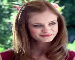 Originally, she is blonde but for her role of Marnie Piper in 